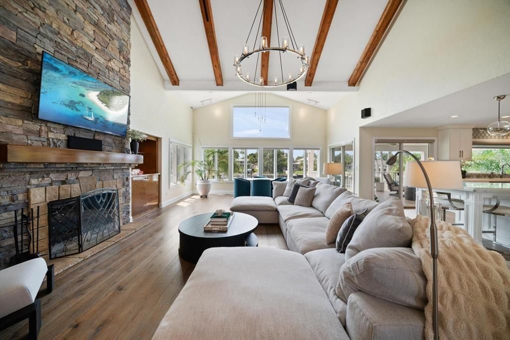 Fireplace, Interior, Living room, Pendant Lights, Recessed Lighting, Stone Walls, Wooden Beams, Wood Texture Flooring