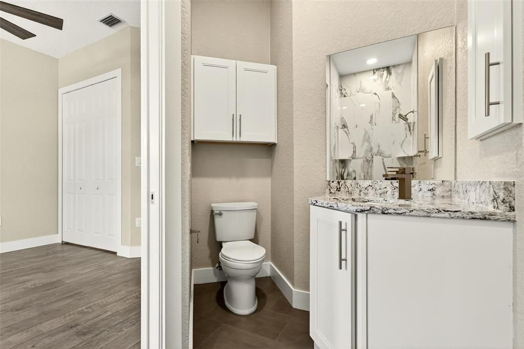 Bathroom, Interior, Marble Walls, Recessed Lighting, Wood Texture Flooring
