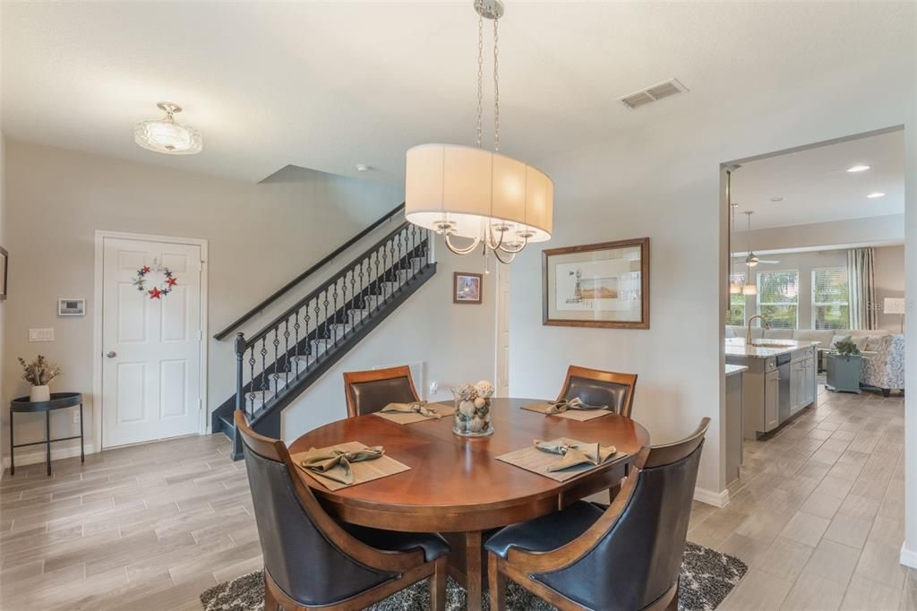 Chandelier, Dining room, Interior, Pendant Lights, Recessed Lighting, Wood Texture Flooring