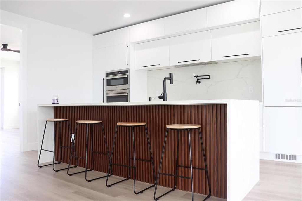 Interior, Kitchen, Marble Walls, Recessed Lighting, Wood Texture Flooring