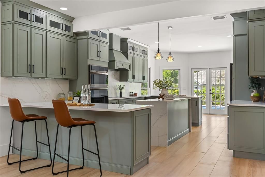 Interior, Kitchen, Marble Walls, Pendant Lights, Recessed Lighting, Stainless Steel Appliances, Wood Texture Flooring