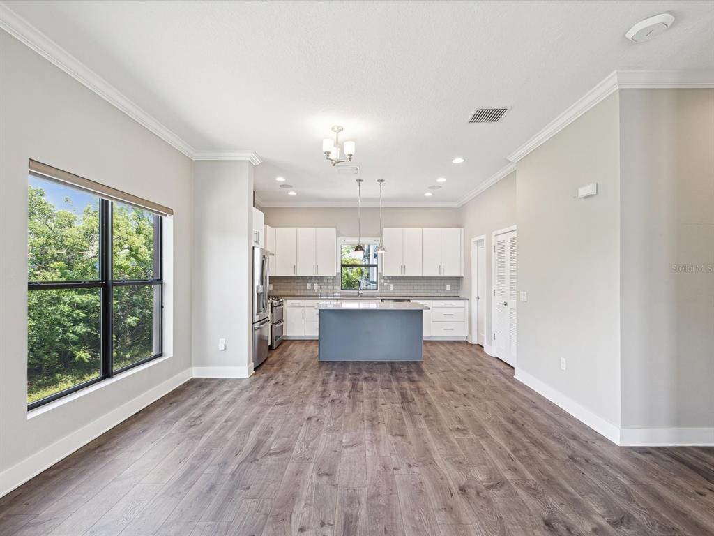 Interior, Kitchen, Pendant Lights, Recessed Lighting, Stainless Steel Appliances, Wood Texture Flooring