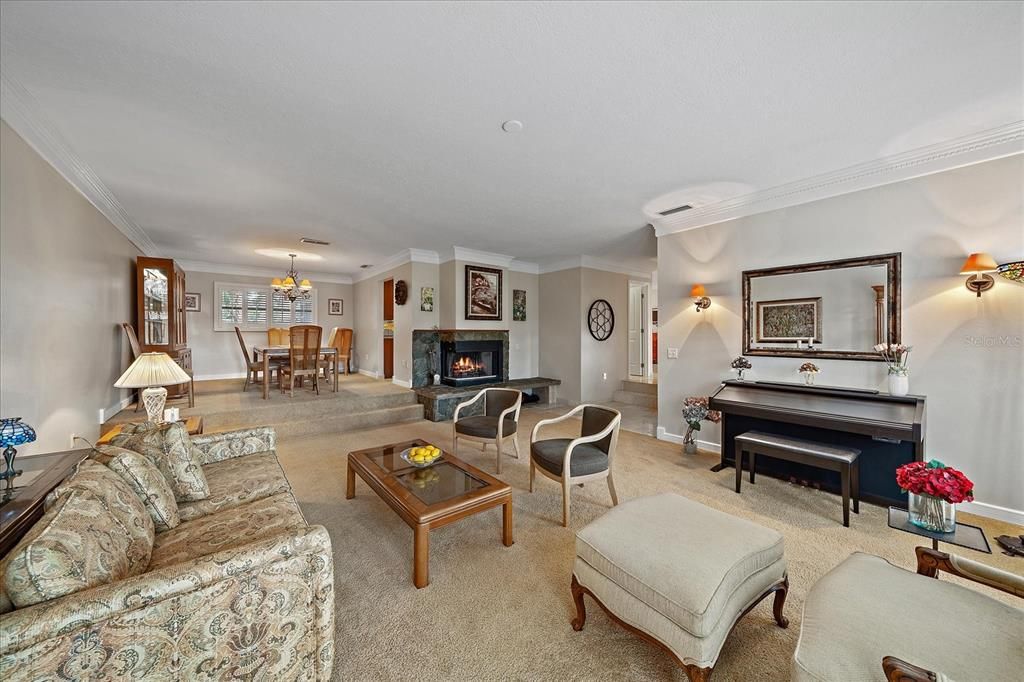 Chandelier, Dining room, Fireplace, Interior, Living room, Piano