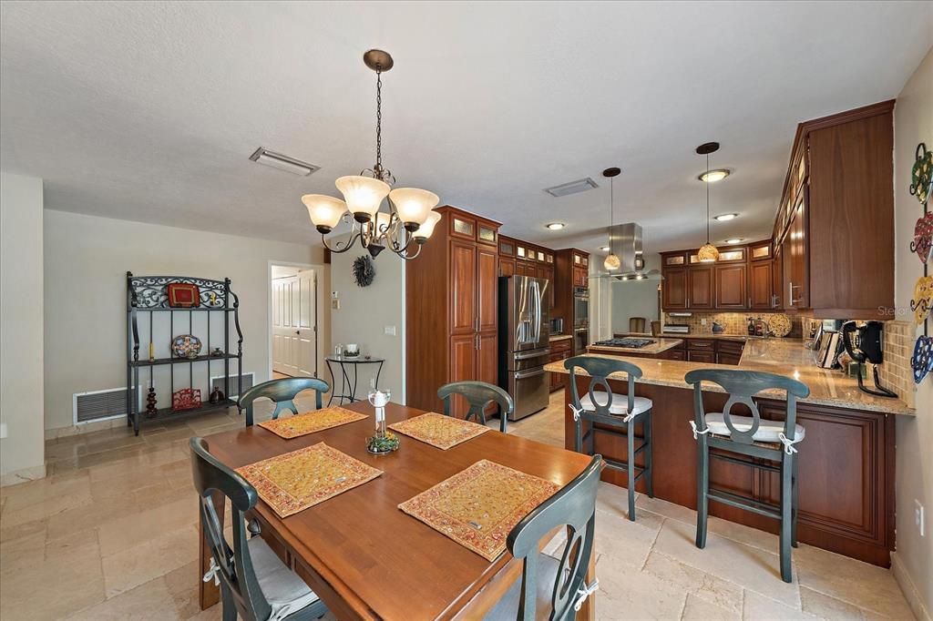 Chandelier, Dining room, Interior, Kitchen, Pendant Lights, Recessed Lighting, Stainless Steel Appliances