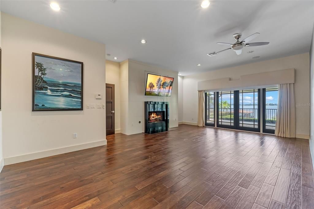 Empty room, Fireplace, Interior, Recessed Lighting, Wood Texture Flooring