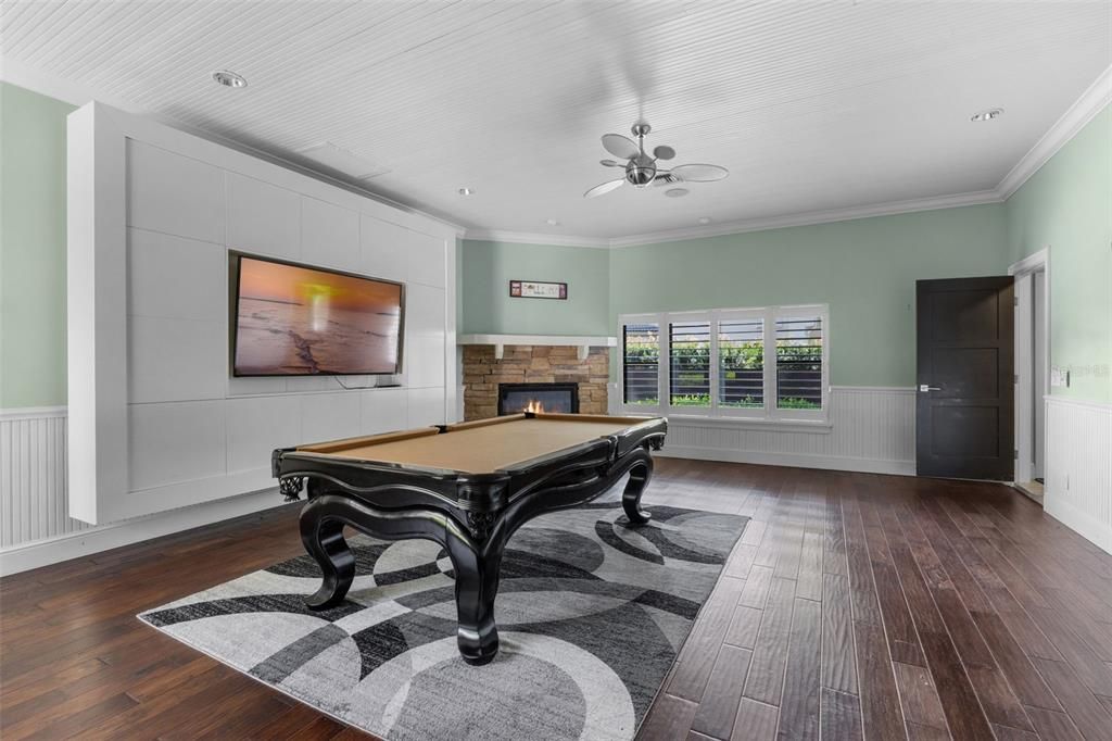 Billiard Table, Fireplace, Game Room, Interior, Recessed Lighting, Wood Texture Flooring