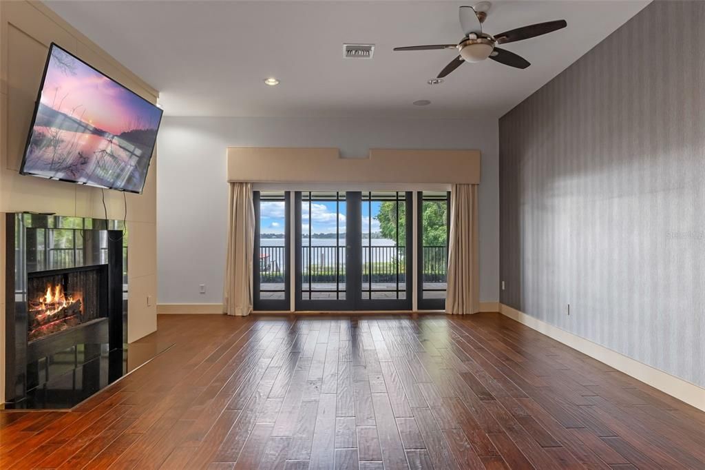 Empty room, Fireplace, Interior, Recessed Lighting, Wood Texture Flooring