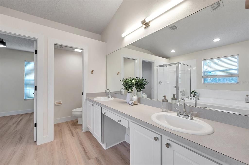 Bathroom, Dual Sink Vanities, Glass Shower, Interior, Recessed Lighting, Wood Texture Flooring