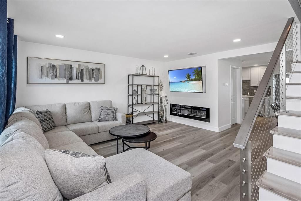 Fireplace, Interior, Living room, Recessed Lighting, Wood Texture Flooring
