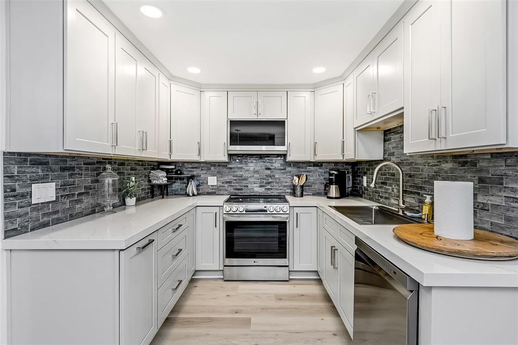 Interior, Kitchen, Recessed Lighting, Stainless Steel Appliances, Wood Texture Flooring
