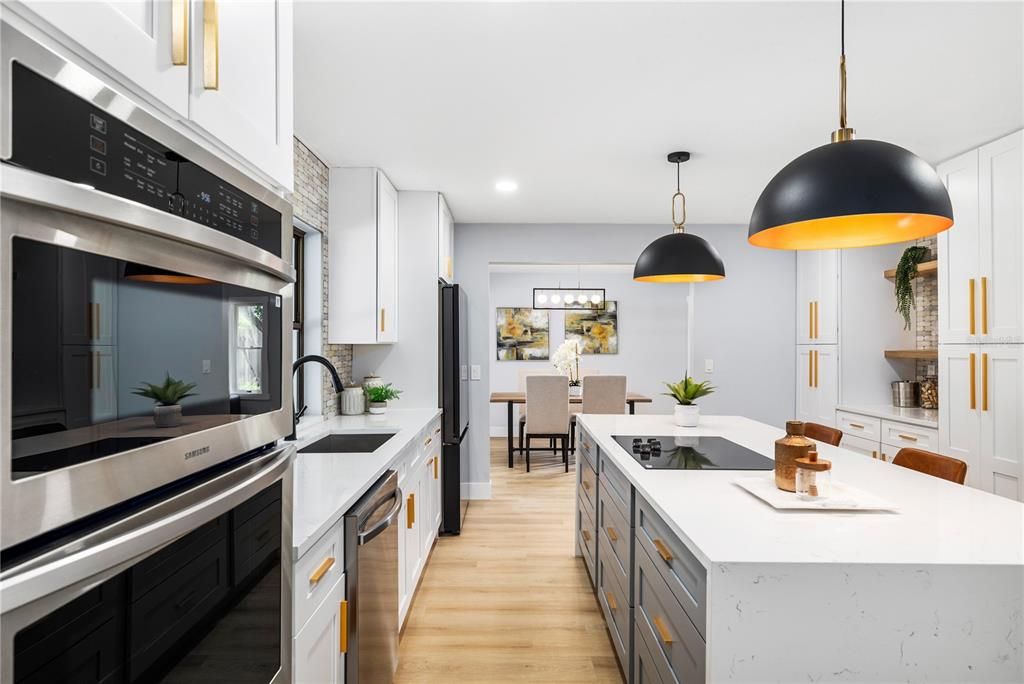 Dining room, Interior, Kitchen, Pendant Lights, Recessed Lighting, Stainless Steel Appliances, Wood Texture Flooring