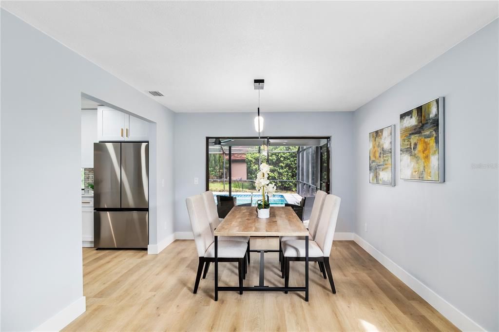 Dining room, Interior, Pendant Lights, Stainless Steel Appliances, Wood Texture Flooring