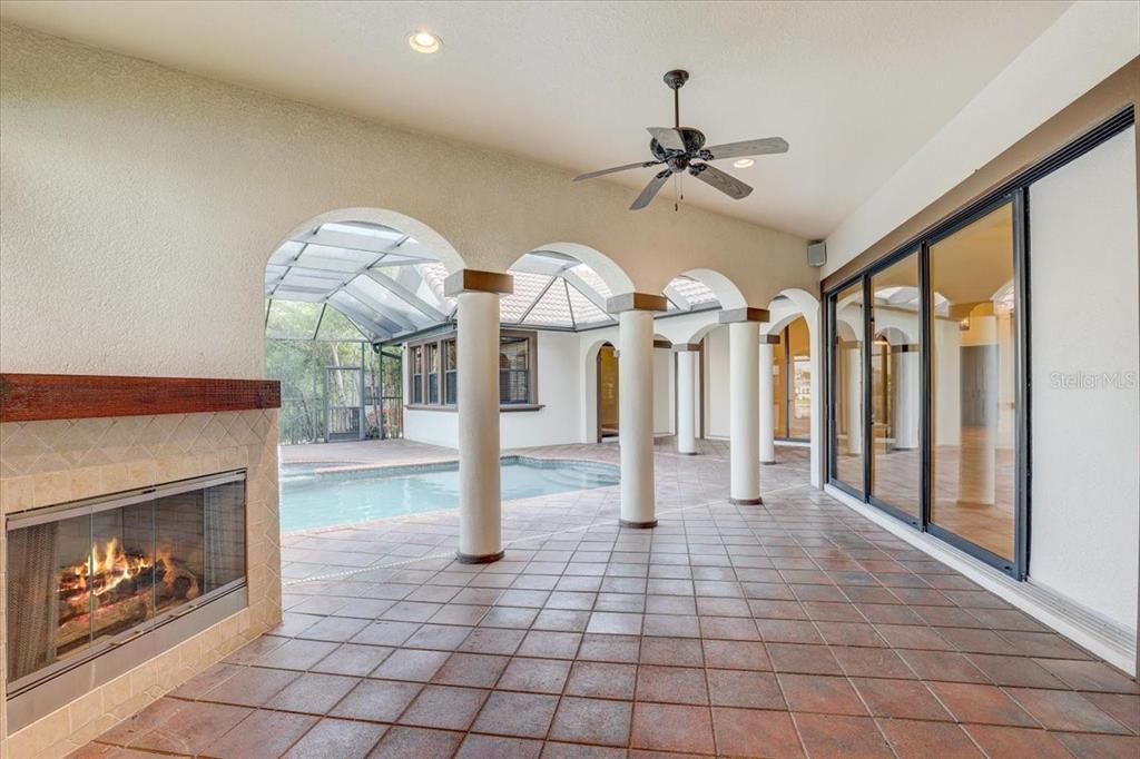 Fireplace, Interior, Pool, Recessed Lighting, Sun Room