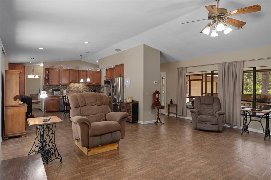 Dining room, Interior, Kitchen, Living room, Pendant Lights, Recessed Lighting, Stainless Steel Appliances, Wood Texture Flooring