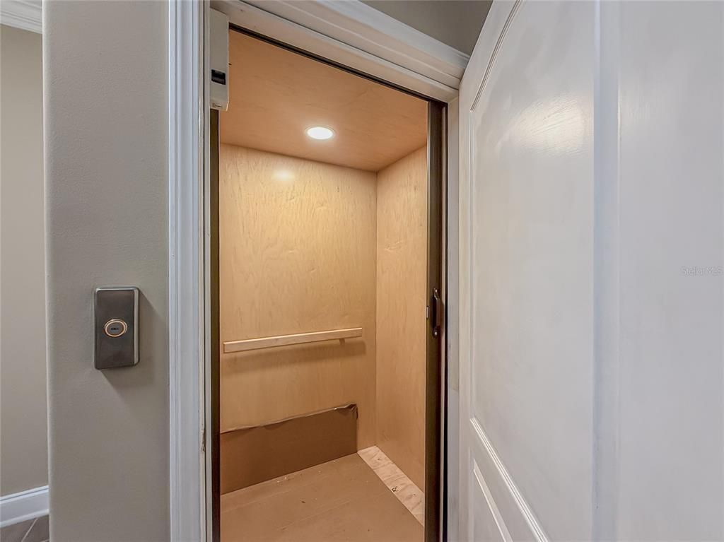 Elevator, Interior, Recessed Lighting, Wooden Walls