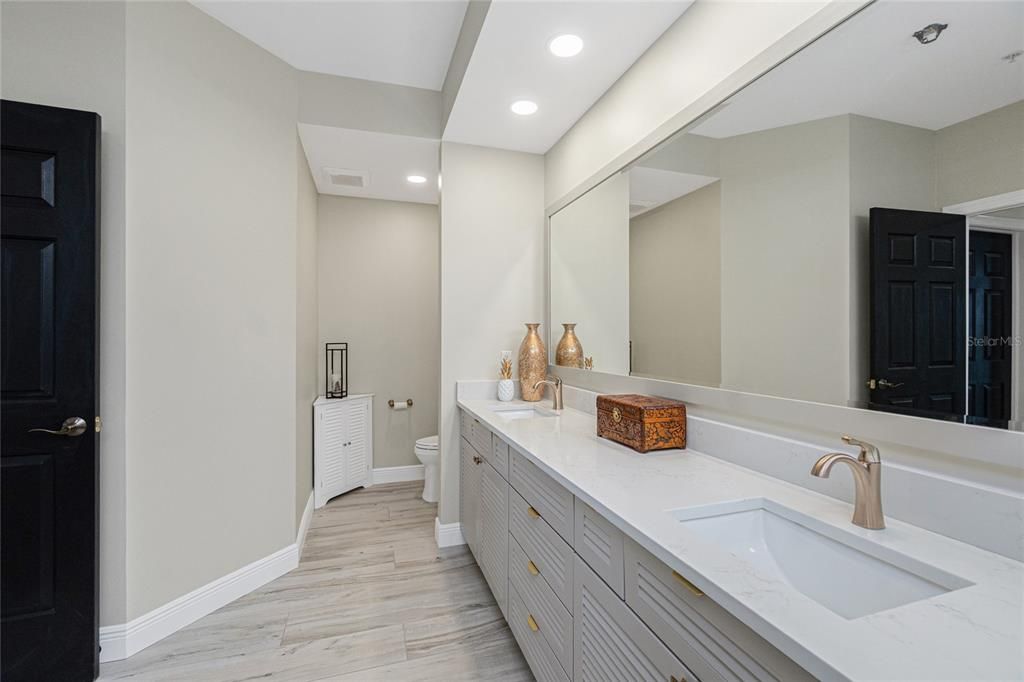 Bathroom, Dual Sink Vanities, Interior, Recessed Lighting, Wood Texture Flooring