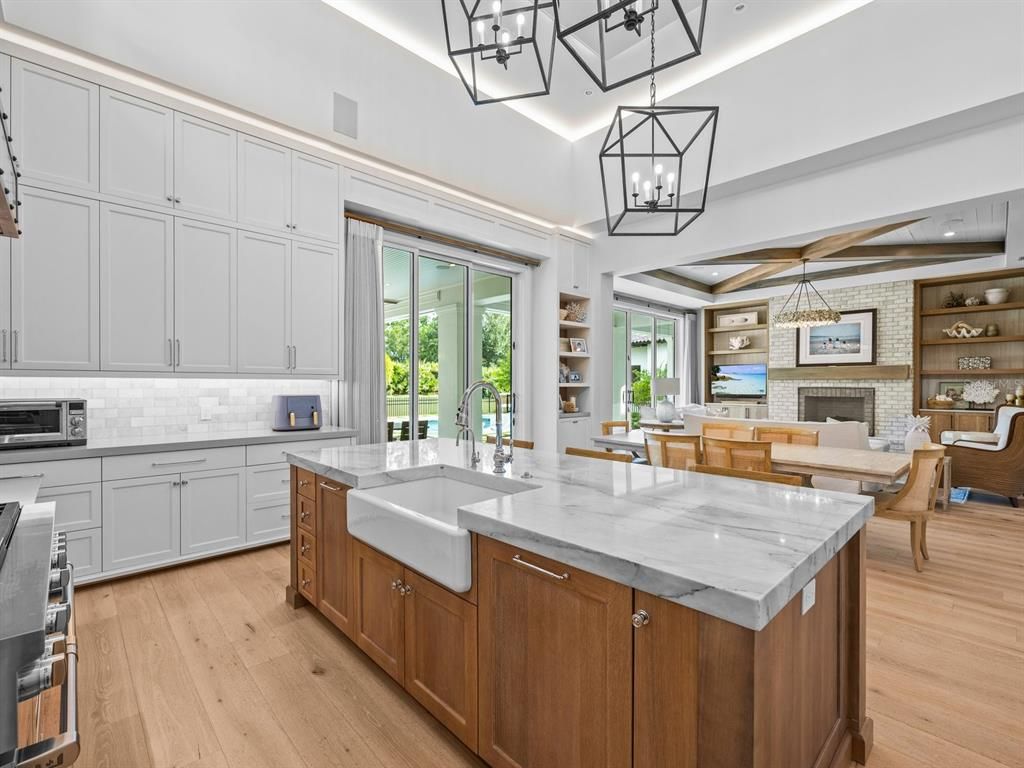 Dining room, Fireplace, Interior, Kitchen, Living room, Pendant Lights, Recessed Lighting, Stone Walls, Wooden Beams, Wood Texture Flooring
