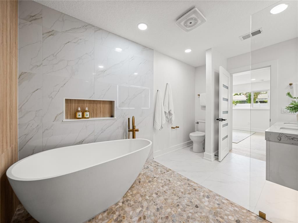 Bathroom, Free Standing Baths, Glass Shower, Interior, Marble, Marble Walls, Recessed Lighting