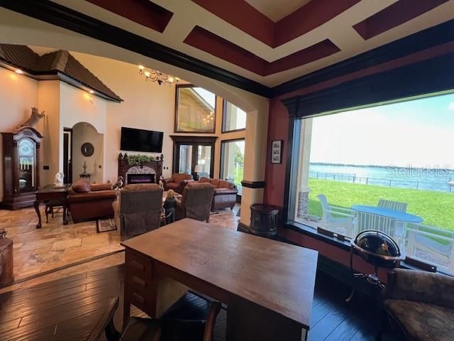 Chandelier, Fireplace, Interior, Living room, Water, Wood Texture Flooring
