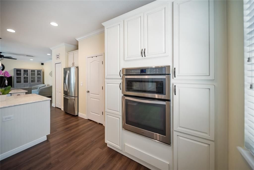 Interior, Kitchen, Recessed Lighting, Stainless Steel Appliances, Washer, Wood Texture Flooring