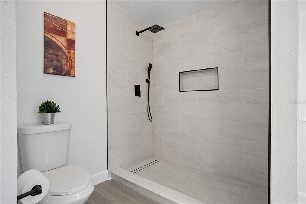 Bathroom, Glass Shower, Interior, Marble Walls, Wood Texture Flooring