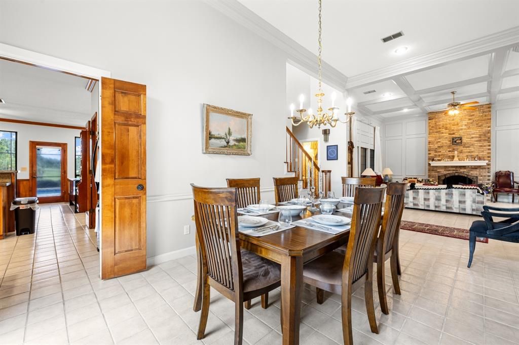 Chandelier, Dining room, Fireplace, Interior, Living room, Recessed Lighting, Stone Walls