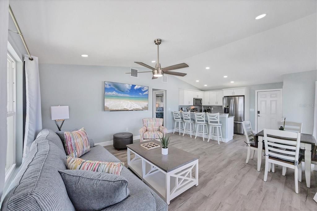 Dining room, Interior, Kitchen, Living room, Recessed Lighting, Stainless Steel Appliances, Wood Texture Flooring