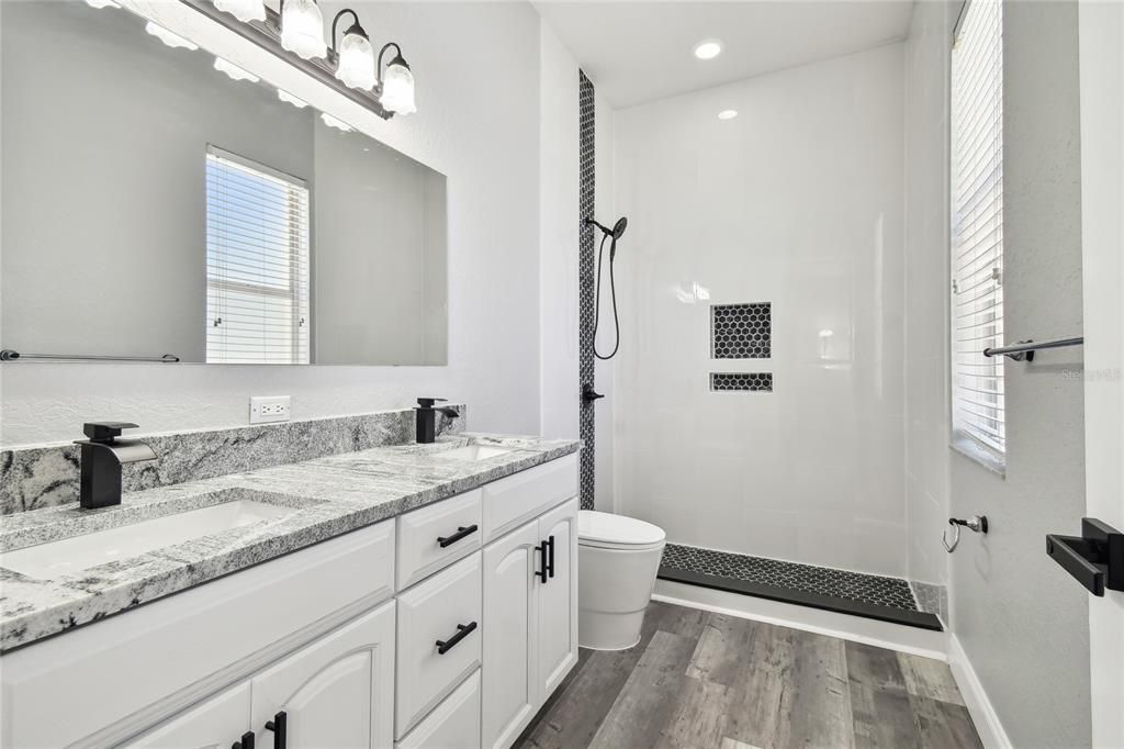 Bathroom, Dual Sink Vanities, Interior, Recessed Lighting, Wood Texture Flooring