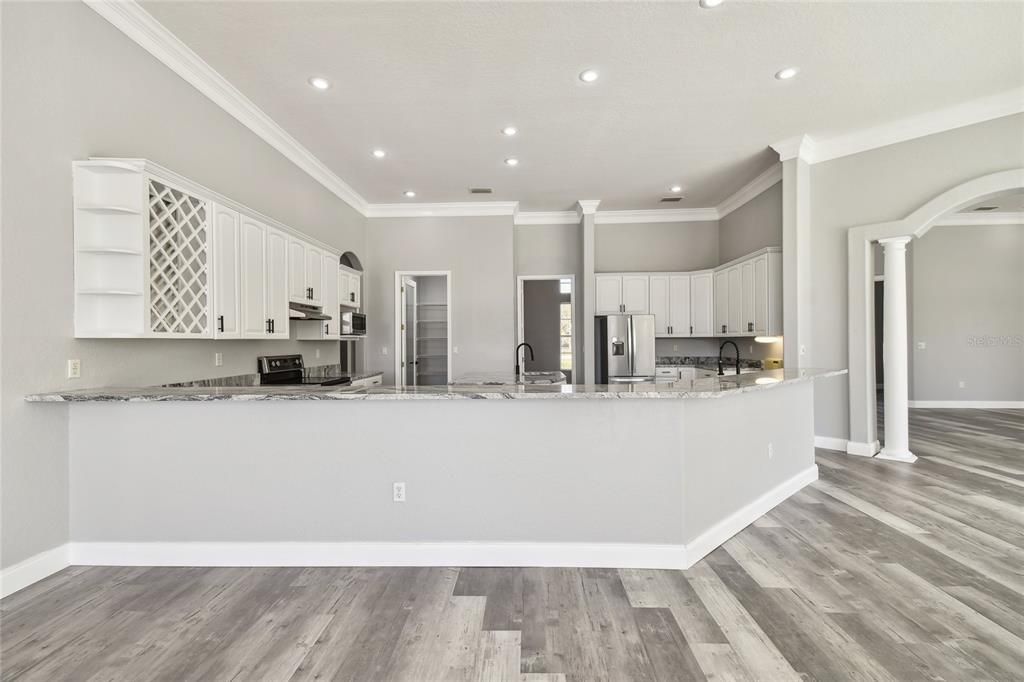 Interior, Kitchen, Recessed Lighting, Stainless Steel Appliances, Wood Texture Flooring
