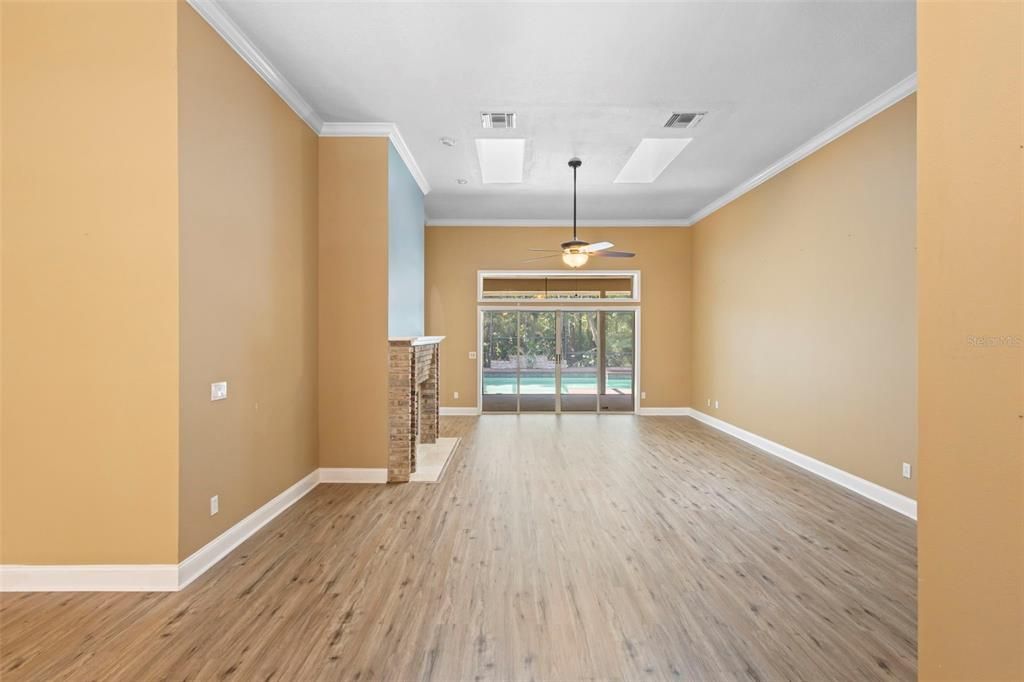 Empty room, Fireplace, Interior, Recessed Lighting, Wood Texture Flooring