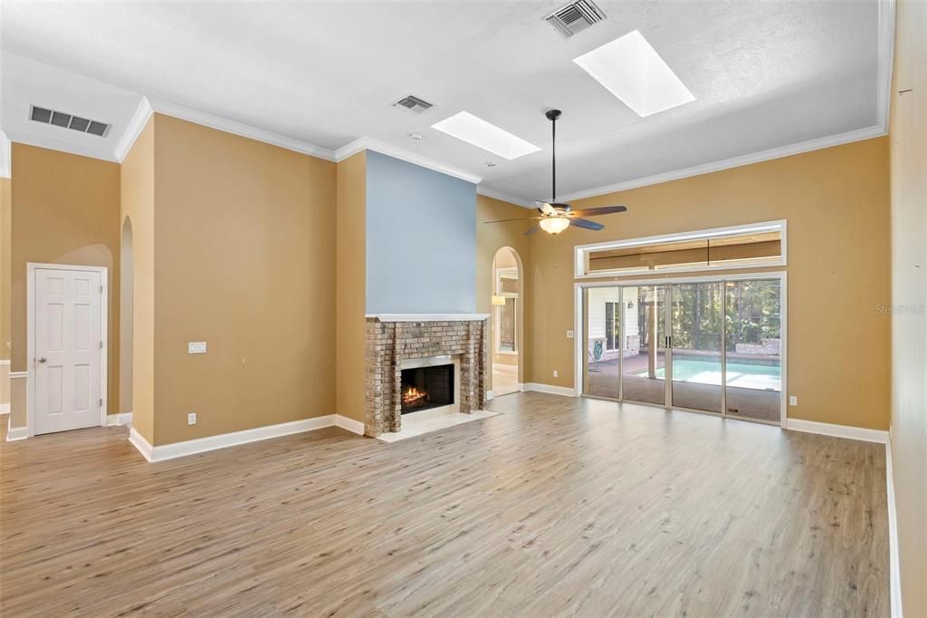 Empty room, Fireplace, Interior, Recessed Lighting, Wood Texture Flooring