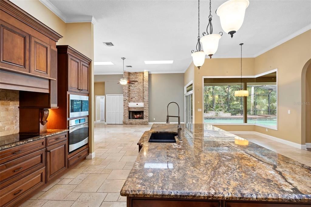 Fireplace, Interior, Kitchen, Pendant Lights, Recessed Lighting, Stone Walls