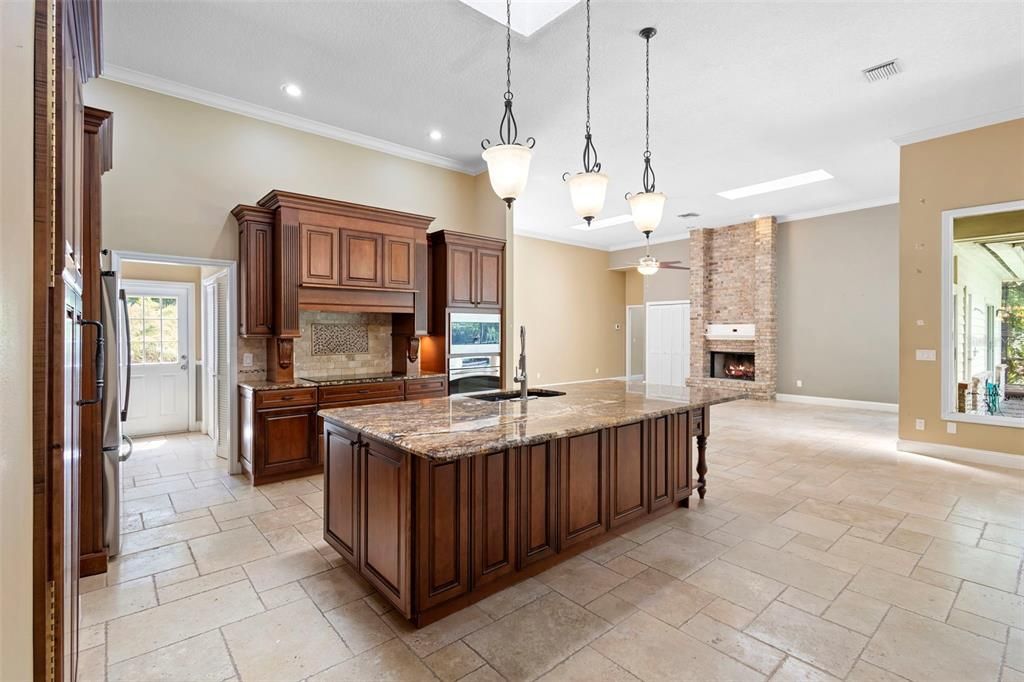 Fireplace, Interior, Kitchen, Pendant Lights, Recessed Lighting, Stone Walls
