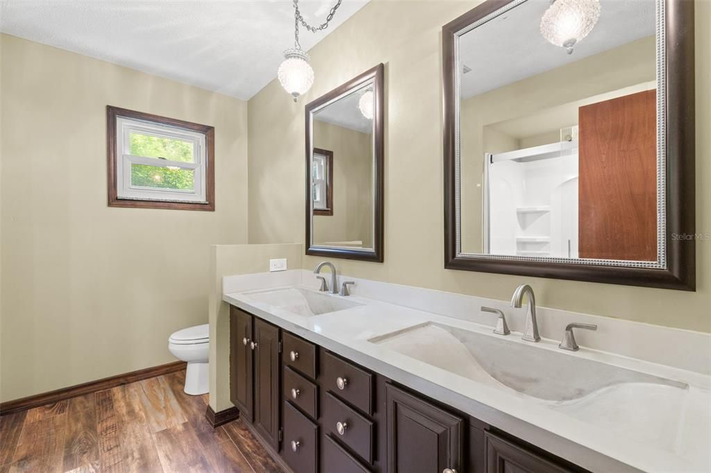 Bathroom, Dual Sink Vanities, Interior, Pendant Lights, Wood Texture Flooring