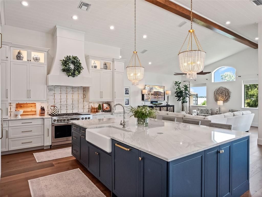 Chandelier, Interior, Kitchen, Living room, Pendant Lights, Recessed Lighting, Stainless Steel Appliances, Wooden Beams, Wood Texture Flooring