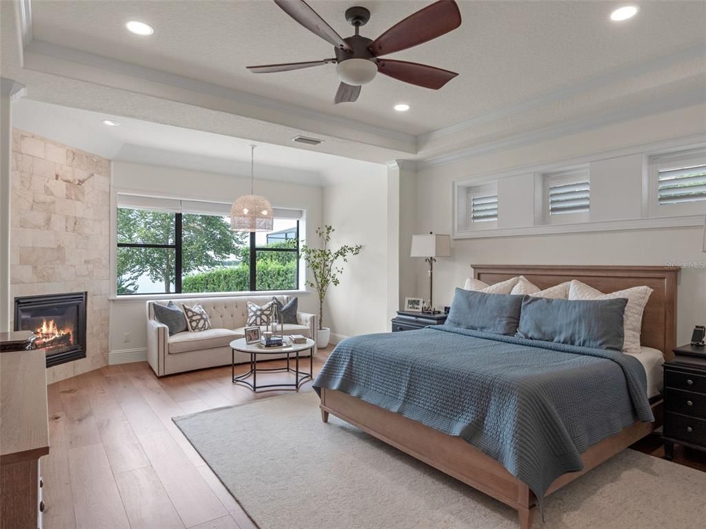 Bedroom, Fireplace, Interior, Pendant Lights, Recessed Lighting, Wood Texture Flooring