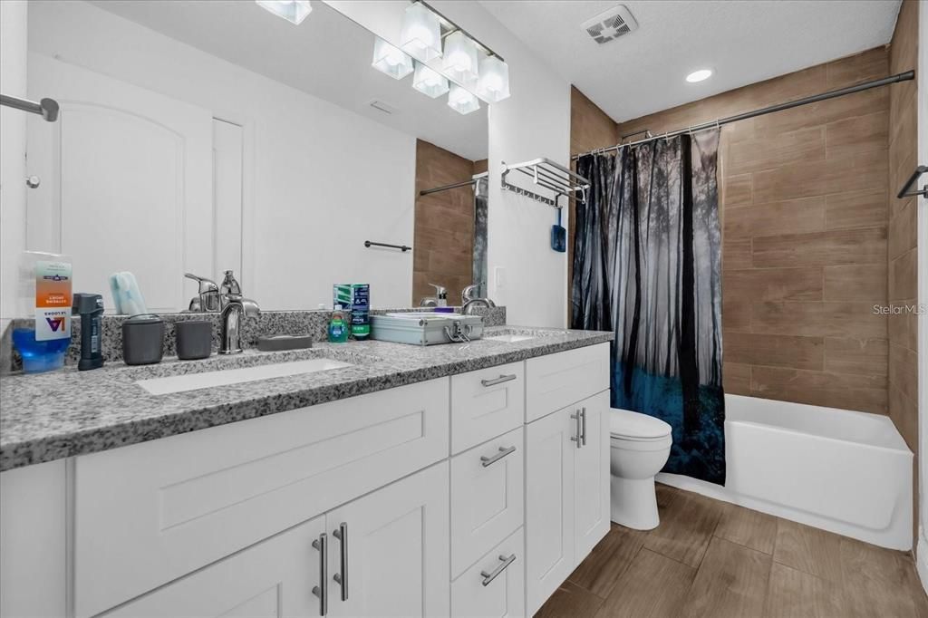 Bathroom, Dual Sink Vanities, Interior, Recessed Lighting, Wood Texture Flooring