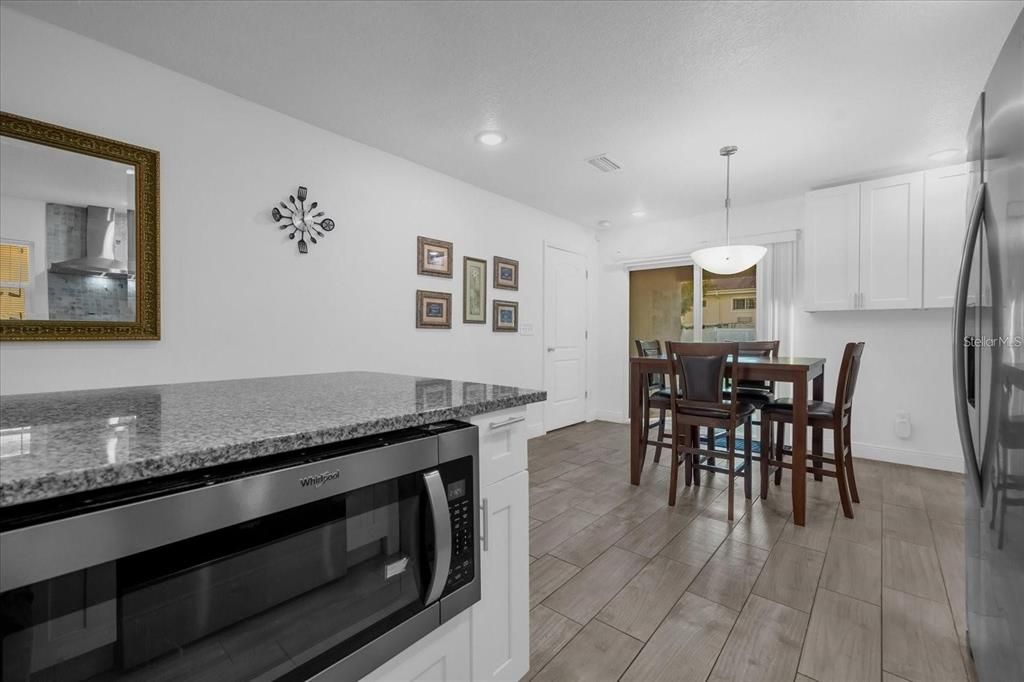 Dining room, Interior, Kitchen, Pendant Lights, Recessed Lighting, Wood Texture Flooring