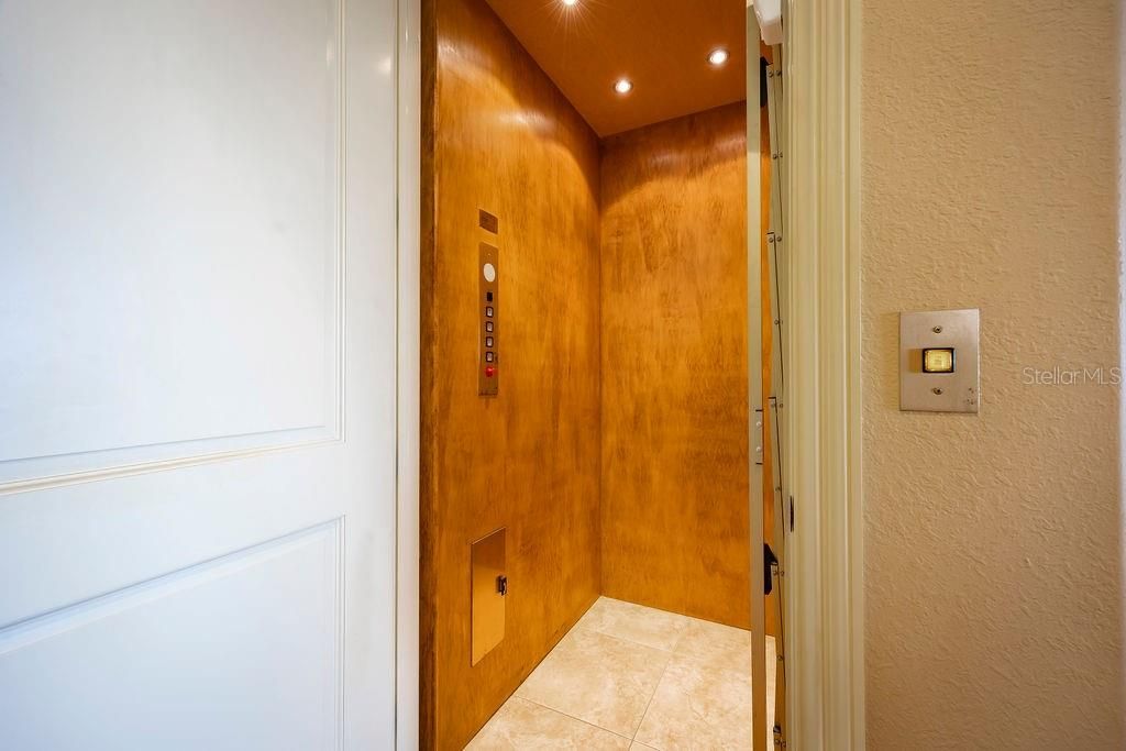 Elevator, Interior, Recessed Lighting, Wooden Ceilings, Wooden Walls