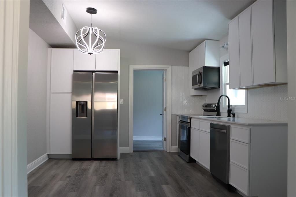 Interior, Kitchen, Pendant Lights, Stainless Steel Appliances, Wood Texture Flooring