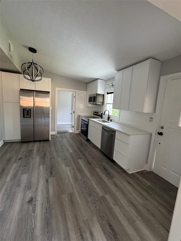 Interior, Kitchen, Pendant Lights, Stainless Steel Appliances, Wood Texture Flooring
