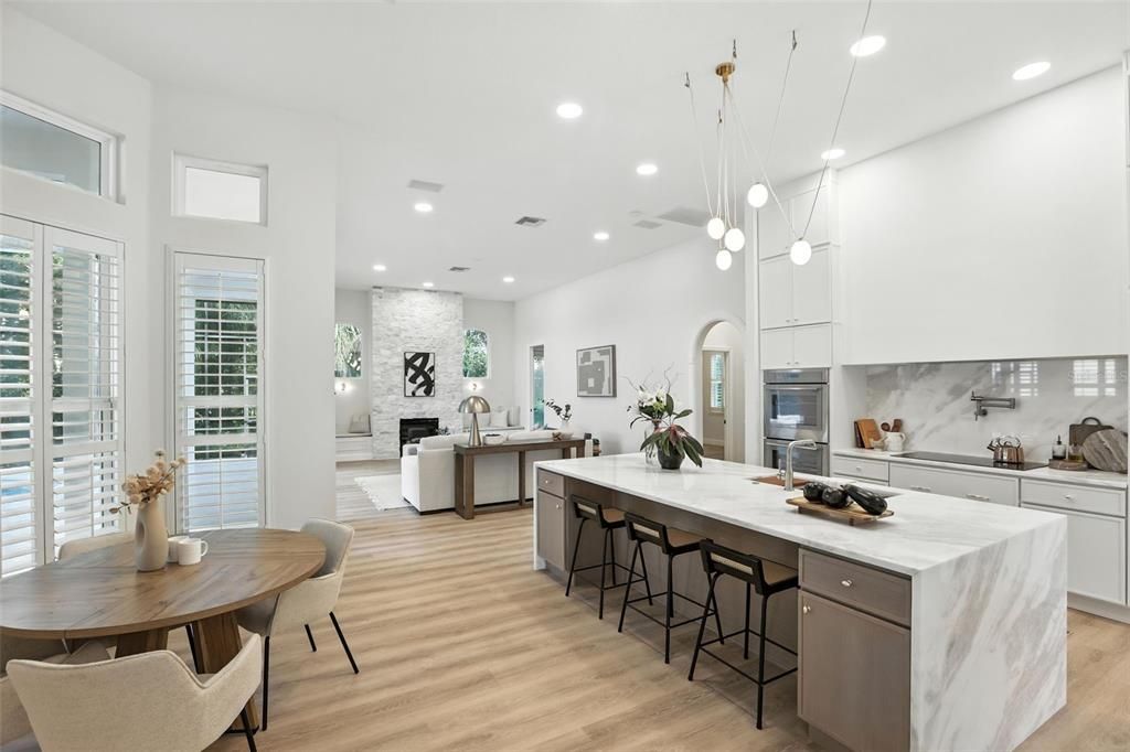 Fireplace, Interior, Kitchen, Living room, Pendant Lights, Recessed Lighting, Wood Texture Flooring