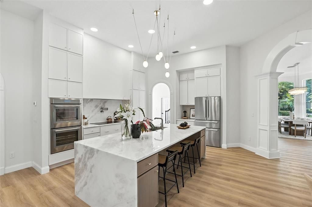Dining room, Interior, Kitchen, Pendant Lights, Recessed Lighting, Stainless Steel Appliances, Wood Texture Flooring