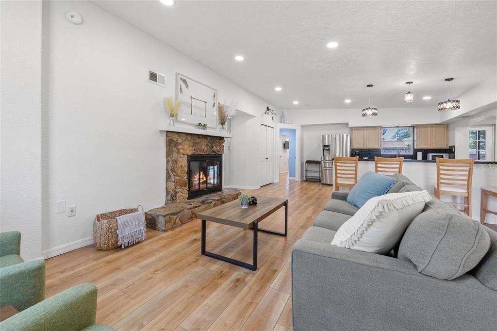 Fireplace, Interior, Kitchen, Living room, Pendant Lights, Recessed Lighting, Wood Texture Flooring