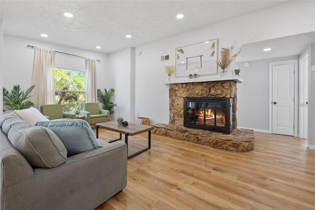 Fireplace, Interior, Living room, Recessed Lighting, Wood Texture Flooring