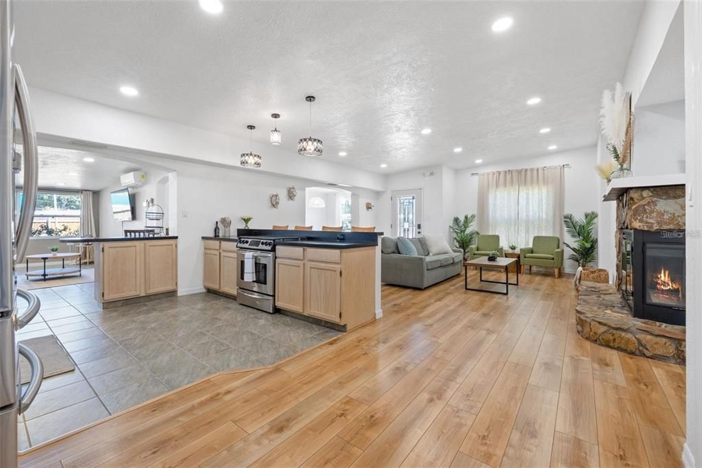 Fireplace, Interior, Kitchen, Living room, Pendant Lights, Recessed Lighting, Wood Texture Flooring