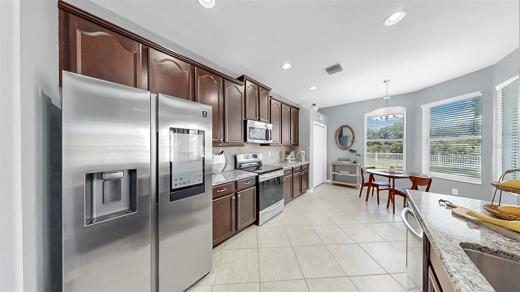 Chandelier, Dining room, Interior, Kitchen, Recessed Lighting, Stainless Steel Appliances