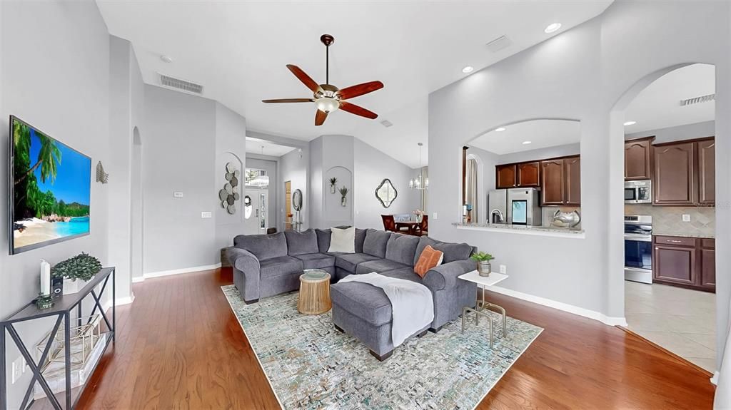Dining room, Interior, Kitchen, Living room, Recessed Lighting, Stainless Steel Appliances, Wood Texture Flooring