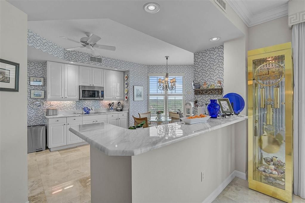 Chandelier, Dining room, Interior, Kitchen, Pendant Lights, Recessed Lighting, Stainless Steel Appliances