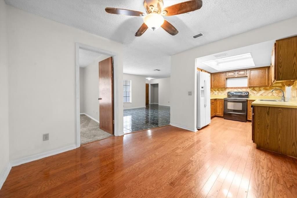 Empty room, Interior, Kitchen, Stainless Steel Appliances, Wood Texture Flooring